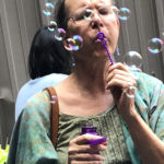 Laura blowing bubbles