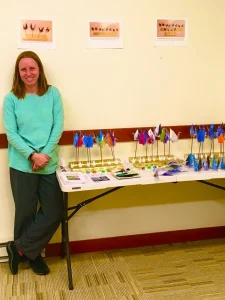 Lisa with Maynard Library items